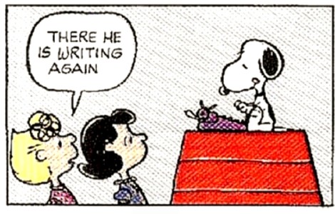 snoopy writing at typewriter
