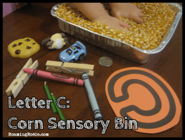 C is for Corn Sensory Bin {Alphabet Activities at RoamingRosie.com}